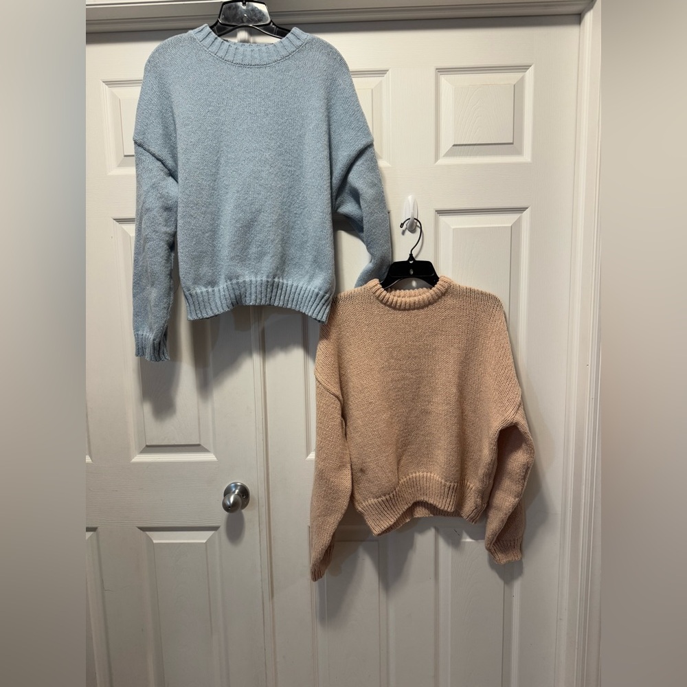 Two (2) sweaters